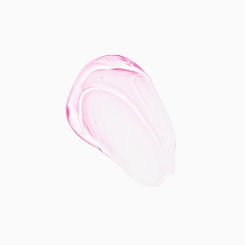 Close-up shot of a clear gel-like beauty product smear with a pink tint on a white backdrop, ideal for showcasing skincare textures.