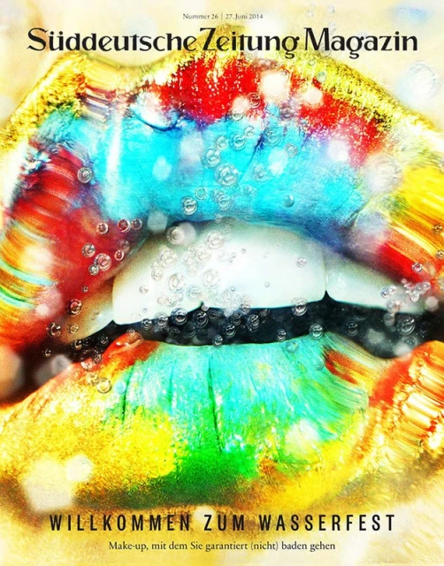 Surreal magazine cover featuring a close-up of lips with colorful makeup and water droplets, promoting a water festival.