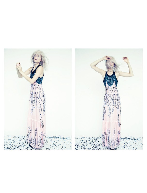 Two images of a blond-haired woman wearing a long pink dress with black embellishments in a studio with confetti on the floor.