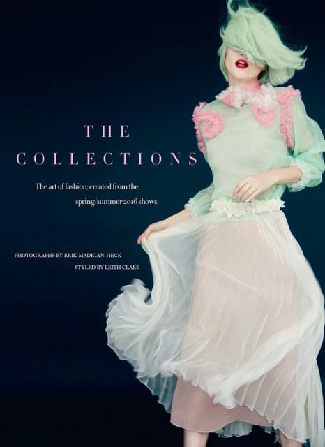 Fashion editorial shot of a model with mint-green hair wearing a translucent green and white dress with pink accents against a dark background.