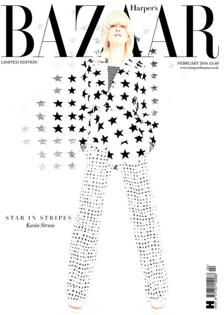 Magazine cover featuring a woman in a star-patterned suit.  The magazine name “BAZAAR” appears at the top in large black letters.