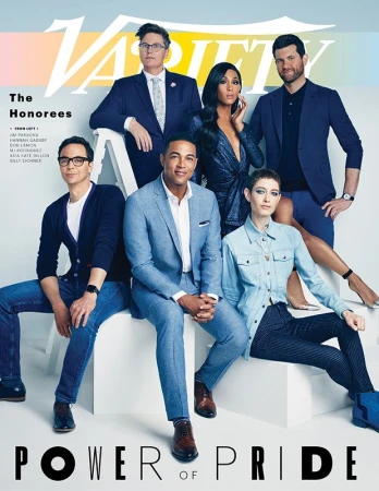 Group portrait of Variety 'Power of Pride' honorees posing on a set of white stairs, against a light backdrop in a photo studio.