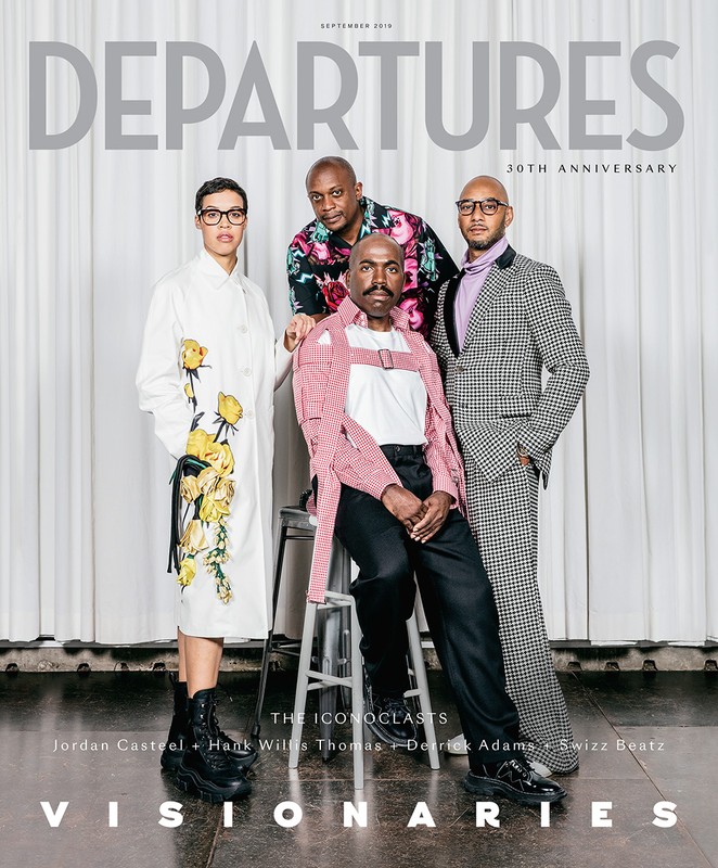 Departures magazine cover with four African American men in stylish outfits posing against a light backdrop. Fashion photography.