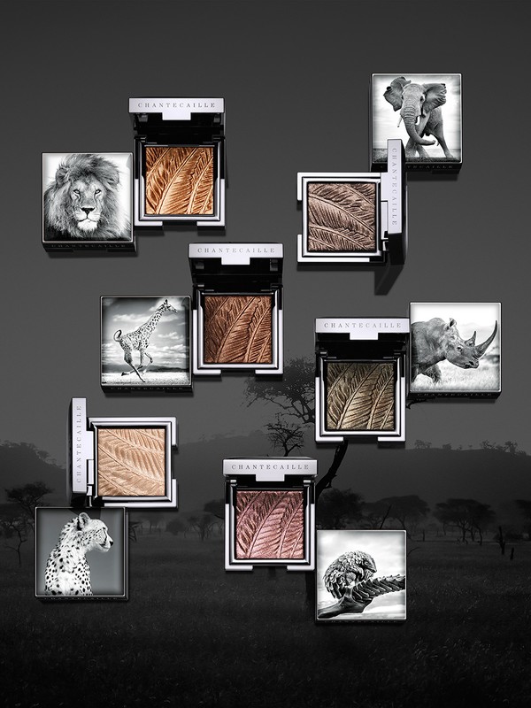 Chantecaille makeup compacts featuring animal images, placed against a muted backdrop suggesting the African savanna.