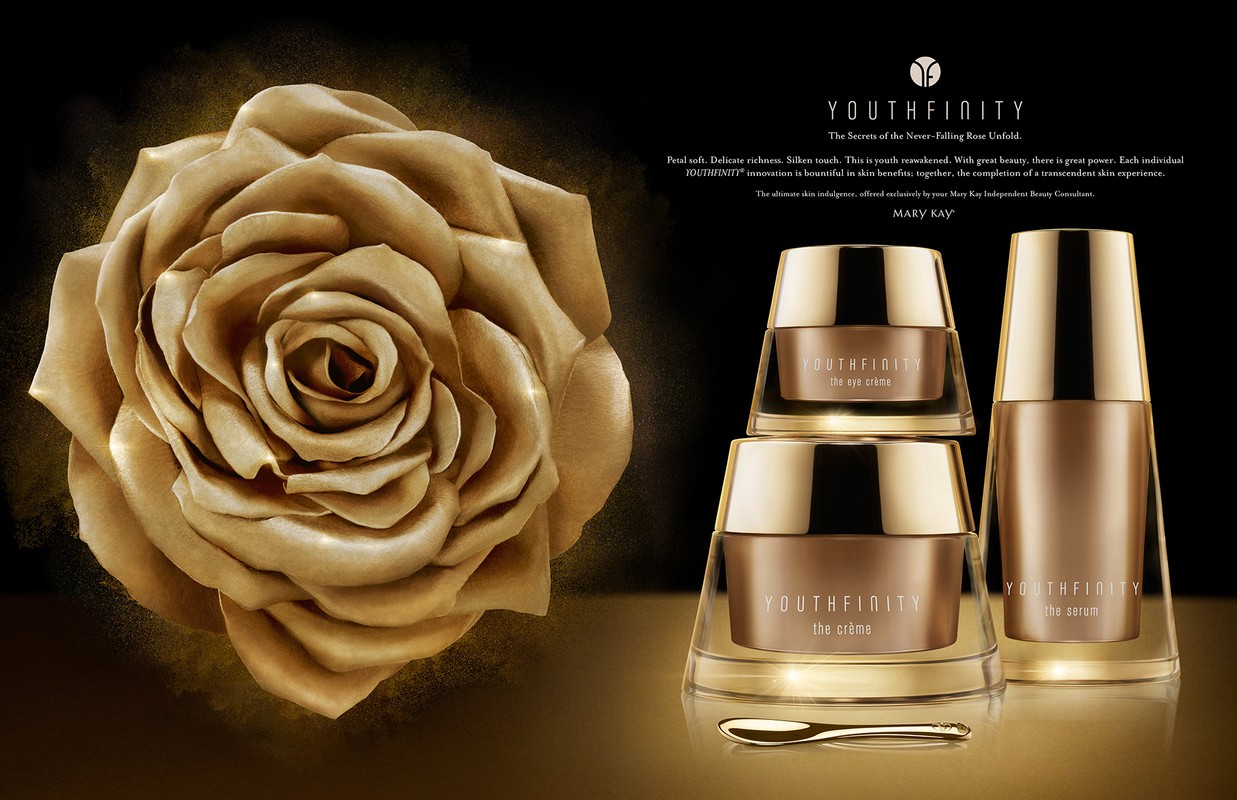 Luxurious skincare product advertisement featuring a golden rose next to a collection of Youthfinity creams and serums by Mary Kay.