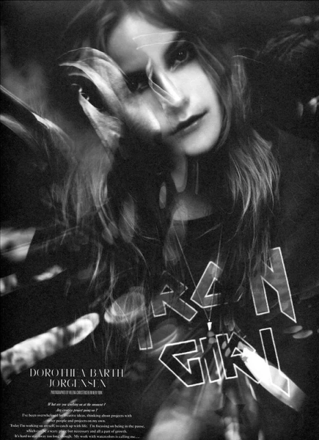 Black-and-white portrait of a woman with long hair and a T-shirt, artistic blur effects, and text overlays. Fashion and beauty editorial.