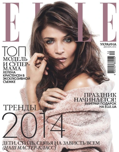 Magazine cover featuring a woman with brown hair and blue eyes, wearing a pink robe. Elle logo and text 'Ukraine' visible on the cover.