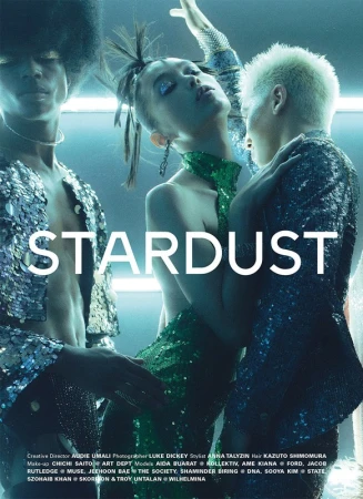 Fashion editorial shot featuring three models with sparkly makeup and outfits. Two models flank one in the middle, studio lighting, and creative direction.