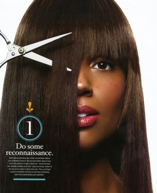 Close-up of a dark-haired woman's face with scissors cutting her bangs, set against a clean white background. Beauty and hair care concept.