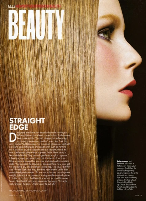 Close-up of a woman's profile in a beauty advertisement, featuring straight blonde hair, and soft pink makeup. Elle magazine cover. 