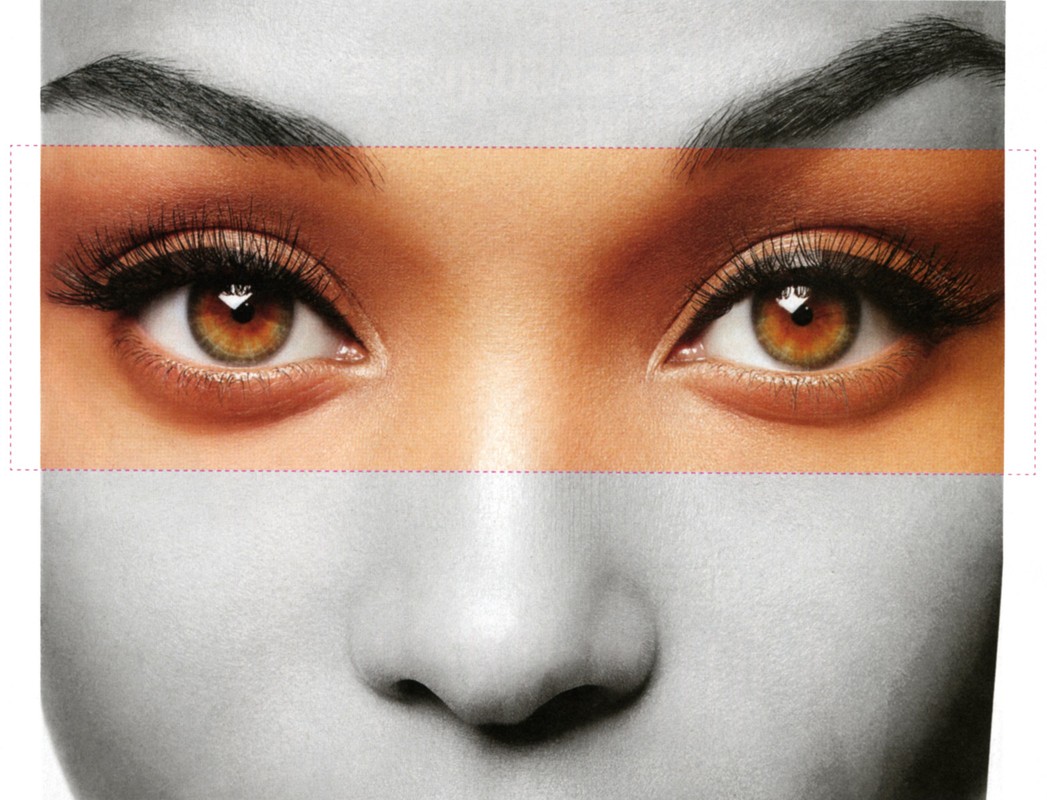 Close-up beauty portrait focusing on warm hazel eyes and eyebrows with neutral eyeshadow and mascara by Christopher Ardoff