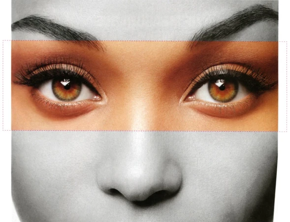 Close-up beauty portrait focusing on warm hazel eyes and eyebrows with neutral eyeshadow and mascara by Christopher Ardoff