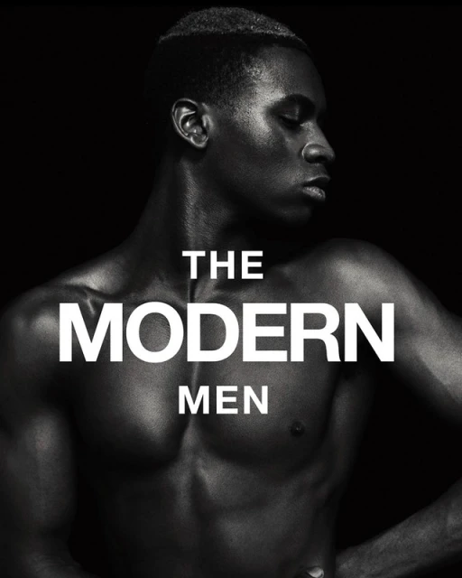 Monochromatic portrait of a muscular adult male with short hair in front of a dark backdrop and the text 'The Modern Men'.