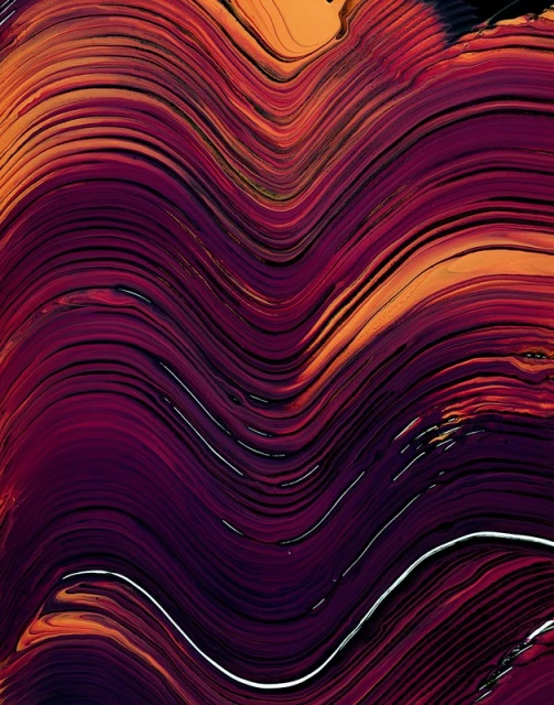Abstract background image featuring flowing lines and swirls in shades of purple, red, orange, and white creating a dynamic composition.