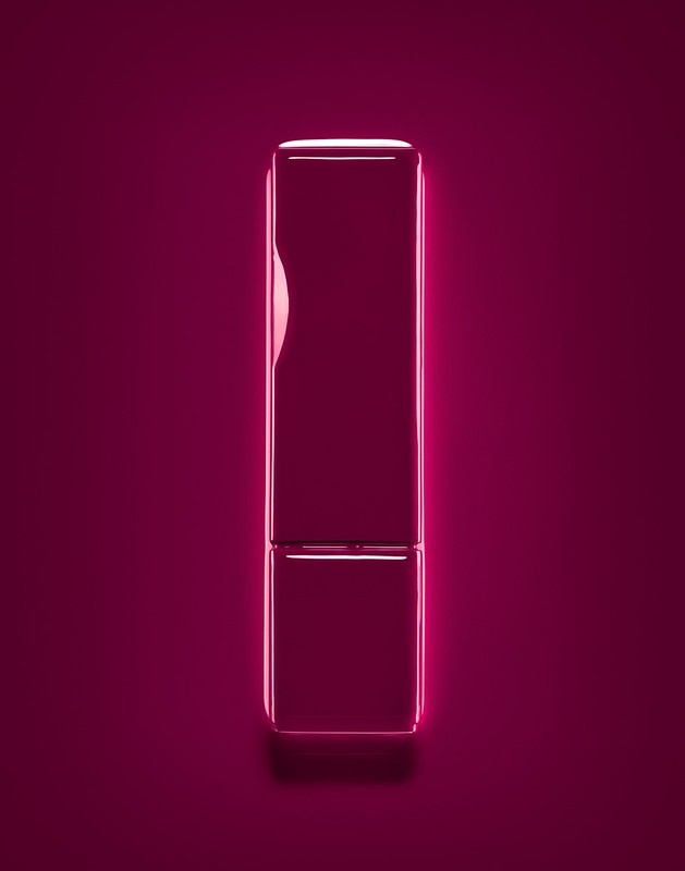 Shiny rectangular column form in deep magenta and red neon light. Product shot for design, architecture, or technology concept.
