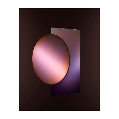 Abstract image with a smooth, reflective, round surface intersecting a square, set against a dark, shadowy background.