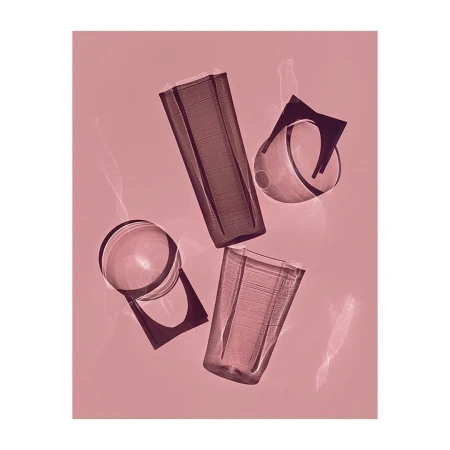 Still life shot of transparent drinking glasses in varying shapes and sizes, arranged against a pink backdrop with lens flares.