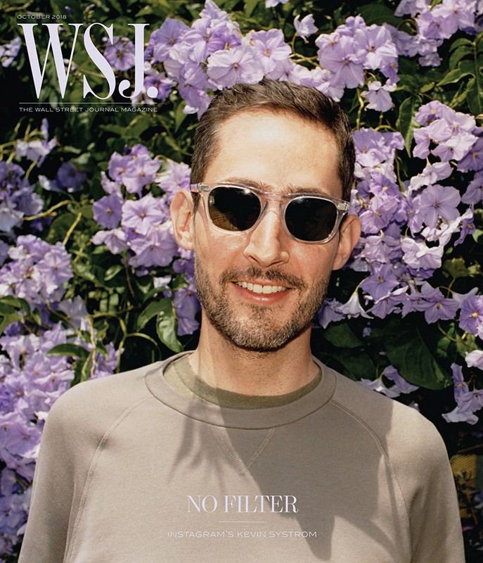 Man wearing sunglasses in front of purple flowers, photographed for WSJ magazine, "No Filter: Instagram's Kevin Systrom" cover. 