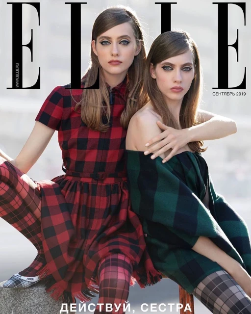 Two women in plaid dresses pose for the cover of Elle magazine, September 2019 issue, in an outdoor setting with neutral lighting.