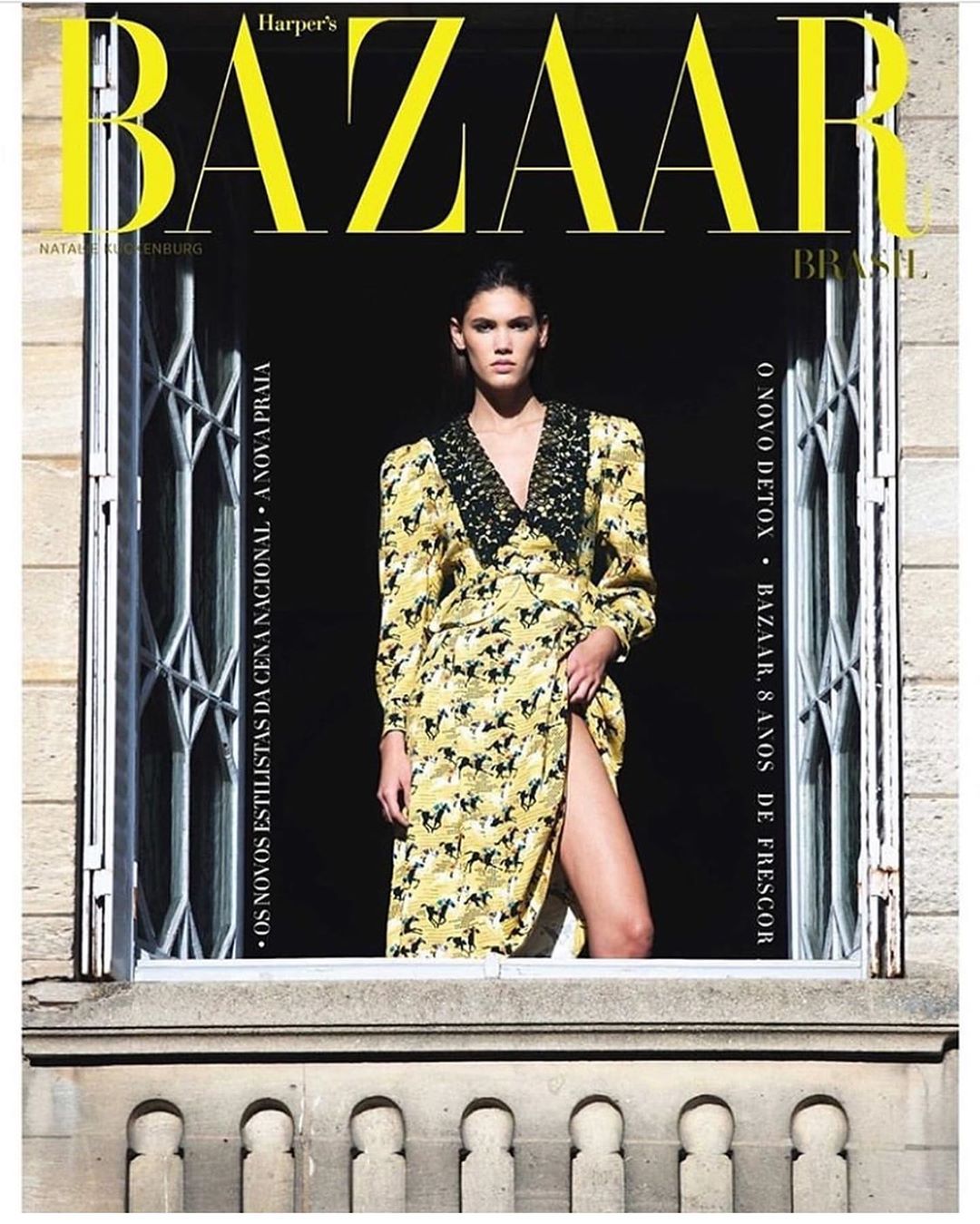 Magazine cover featuring a woman in a horse-print dress posing in a window frame with Harper's Bazaar logo and text overlays.