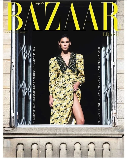 Magazine cover featuring a woman in a horse-print dress posing in a window frame with Harper's Bazaar logo and text overlays.