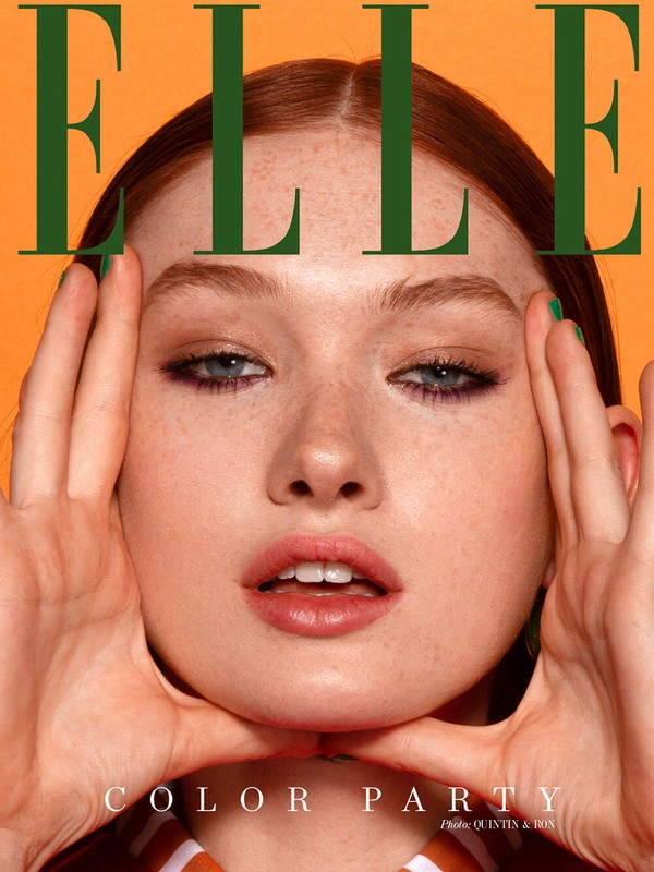 Elle magazine cover featuring a close-up of a model's face framed by hands against an orange background, with green text overlay.