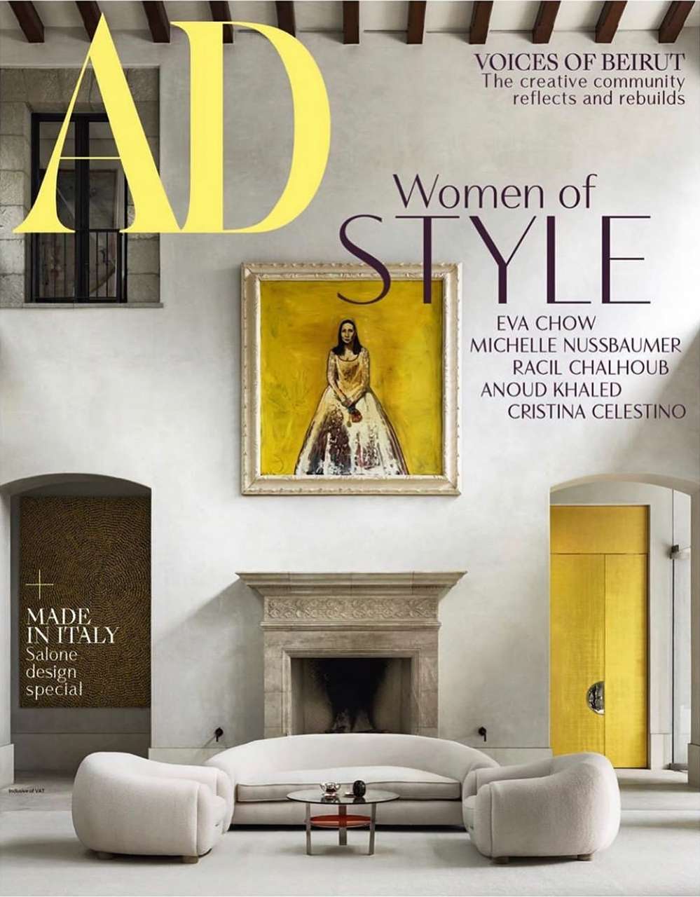 Architectural Digest cover featuring a room interior with white furniture, a painting, and a fireplace, creating a stylish and elegant ambiance.