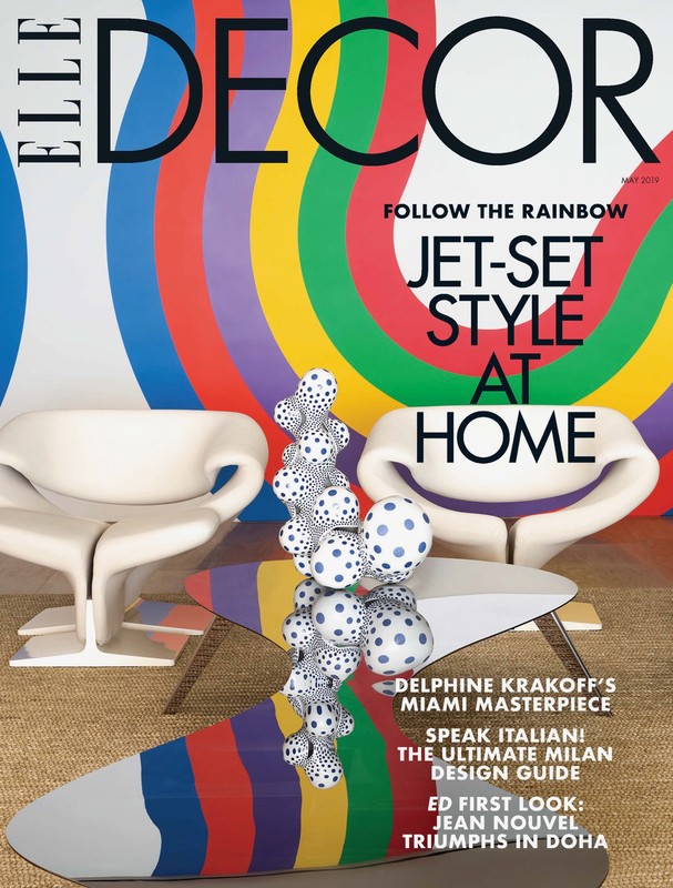 Elle Decor magazine cover featuring white modern furniture, rainbow graphic elements, and abstract dotted sculpture. Interior design trends.