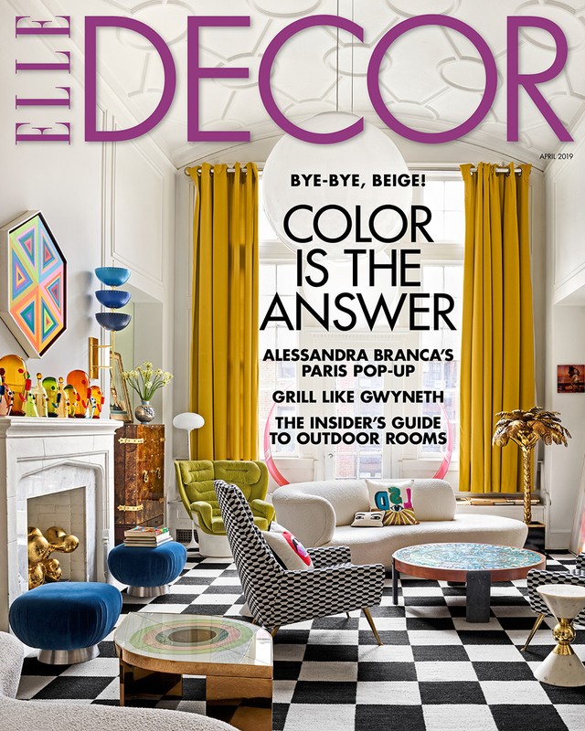 Elle Decor magazine cover showcasing a stylish living room with a black and white checkerboard floor, colorful furniture, and natural light.