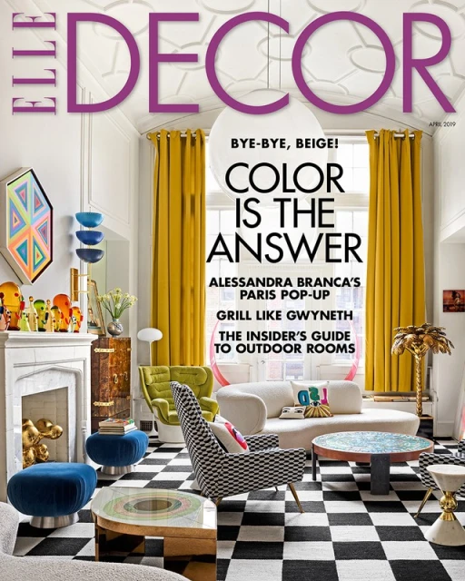Elle Decor magazine cover showcasing a stylish living room with a black and white checkerboard floor, colorful furniture, and natural light.
