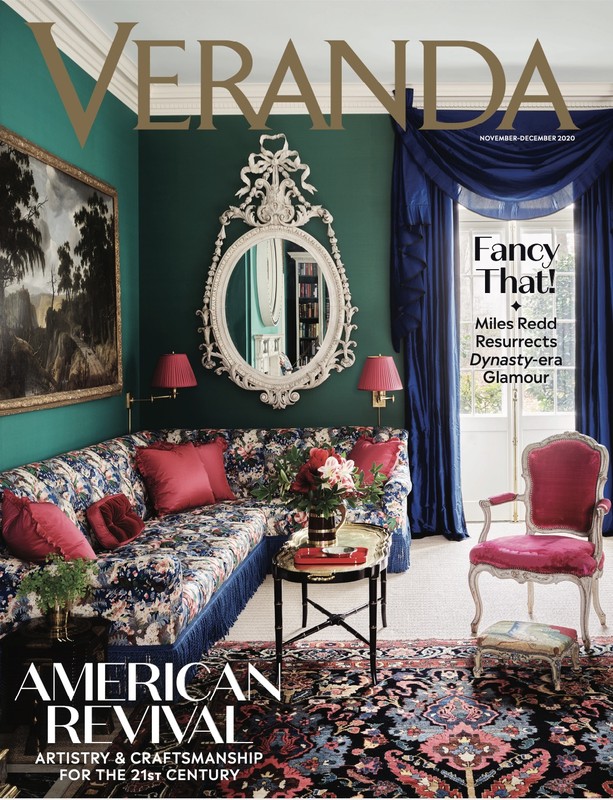 Veranda magazine cover with a lavish interior featuring a floral sofa, antique mirror, dark green walls, and elegant furniture.
