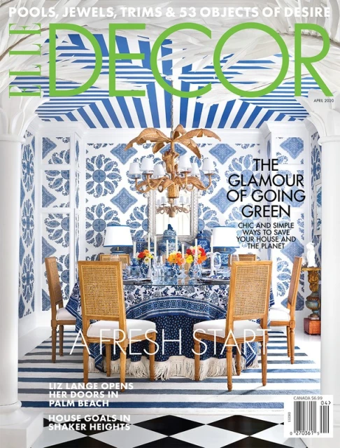 Elle Decor April 2020 magazine cover featuring a dining room with blue patterned wallpaper, a glass table, and wooden chairs.