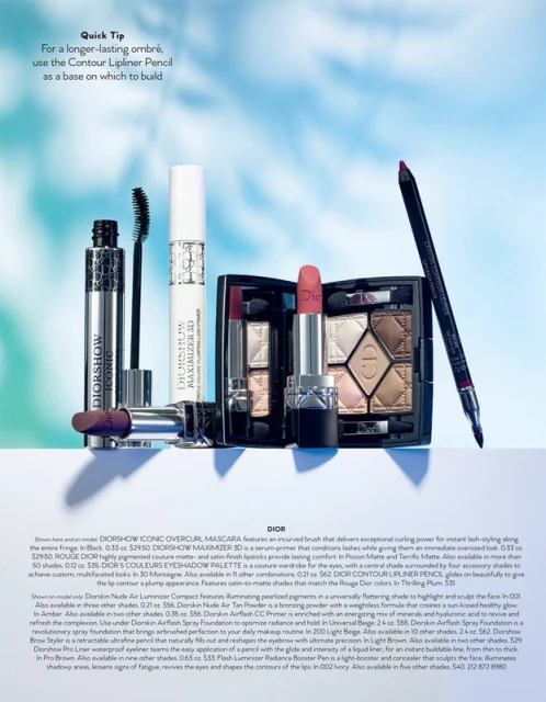 Dior makeup product display with Diorshow Iconic Overcurl Mascara, eyeshadow palette, and Contour Lipliner Pencil on a table against a blue backdrop.