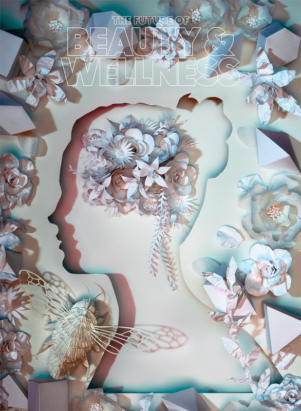 Paper art profile of a woman surrounded by paper flowers and a paper insect, promoting beauty and wellness on a light surface.