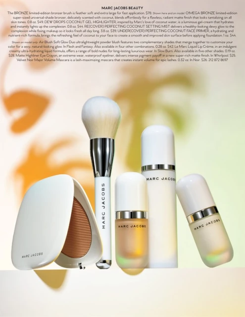Marc Jacobs Beauty products: bronzer brush, bronzer compact, setting mist, gel highlighter, face primer in white packaging on a light surface.
