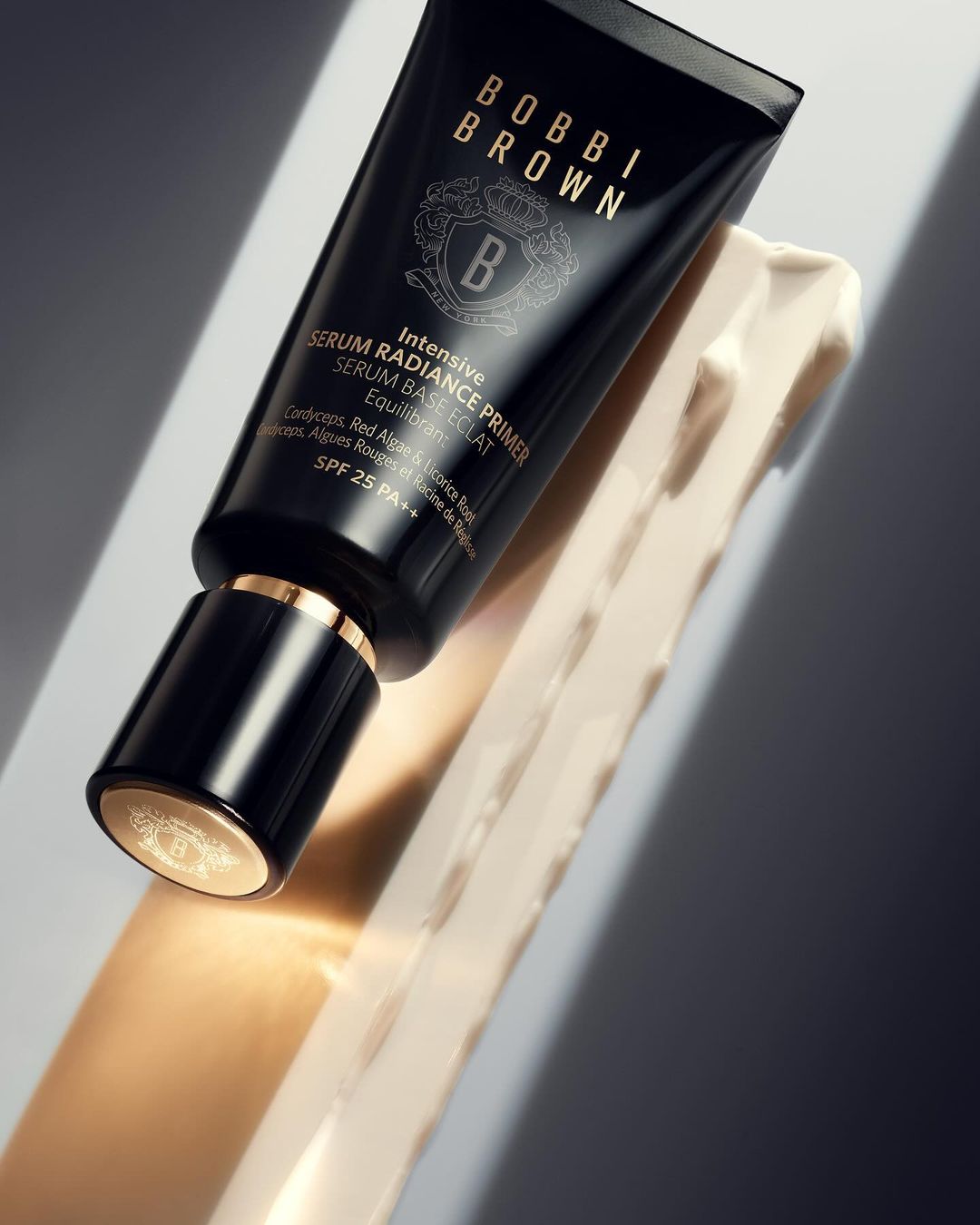 Bobbi Brown Intensive Serum Radiance Primer tube, a luxurious skincare product for achieving radiant and glowing skin complexion.