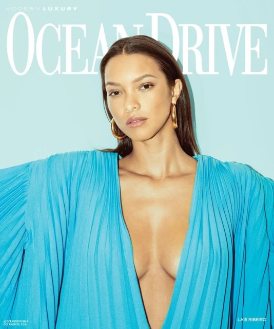 Magazine cover featuring a woman in a turquoise dress, with 'Ocean Drive' title text. The model has golden hoop earrings.