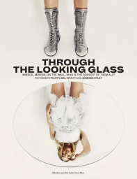 Model wearing silver boots and a white tulle dress viewed upside down in a circular mirror with text overlay.