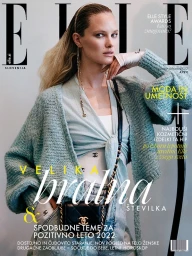 Model wearing a textured light blue knit cardigan and white top posing for Elle magazine cover by Jennifer Covington-bowers.