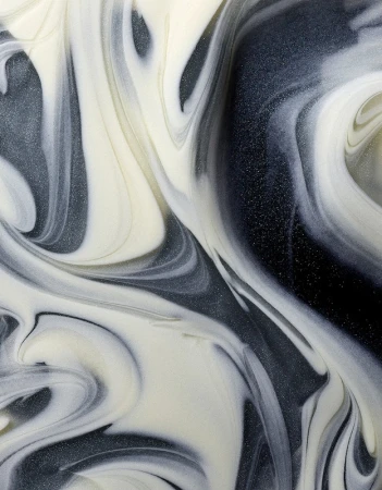 Abstract background with swirling patterns of white, gray, and black liquid creating a smooth, undulating surface.