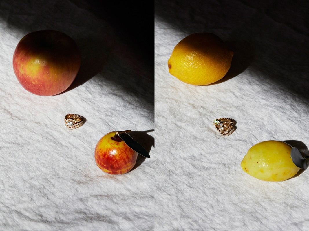 Two fruit still life images on textured white paper featuring a gold diamond ring alongside apples and lemons under harsh side lighting.