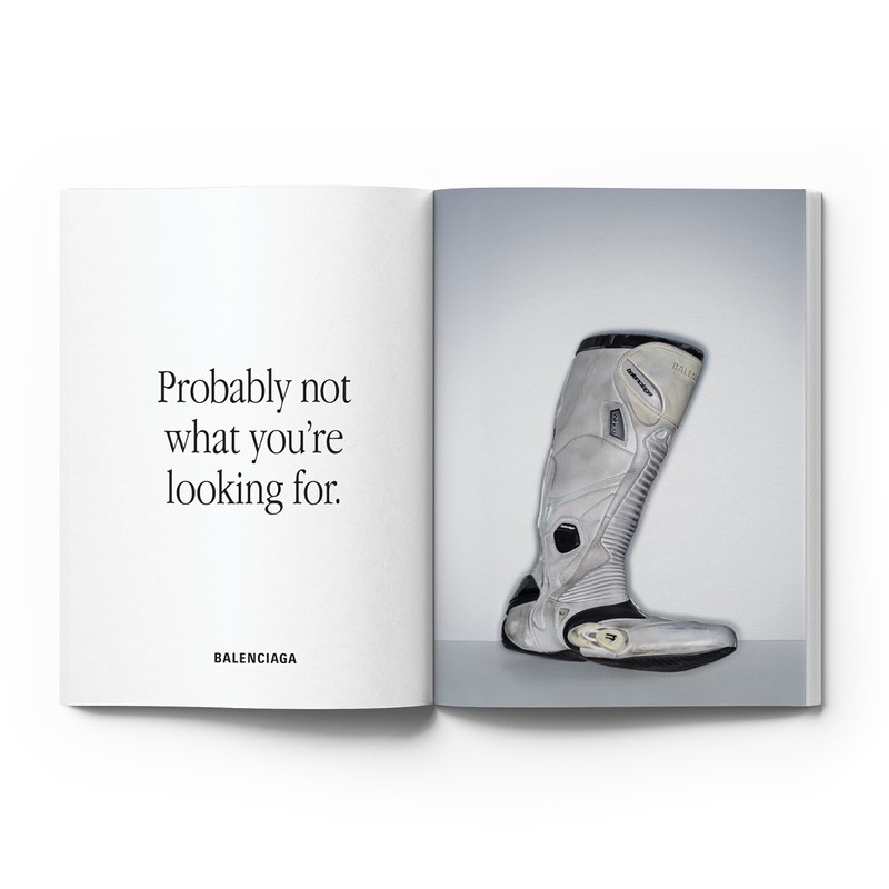 Open magazine spread featuring a Balenciaga boot on a gray backdrop, contrasted with text 'Probably not what you're looking for'.
