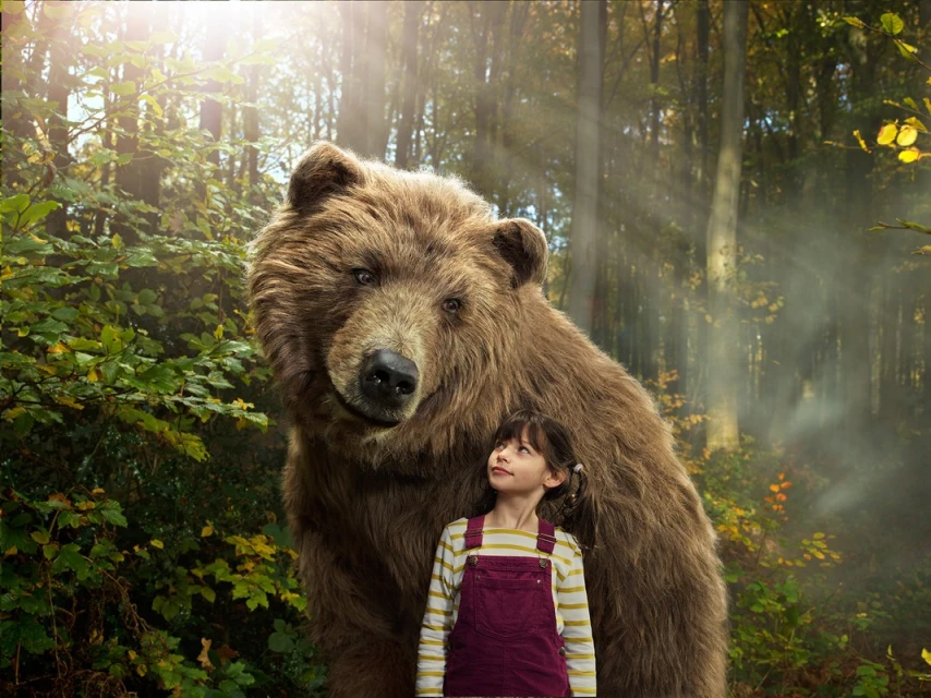 A large brown bear towers over a small child standing outdoors in a sunny forest. A digitally rendered image.
