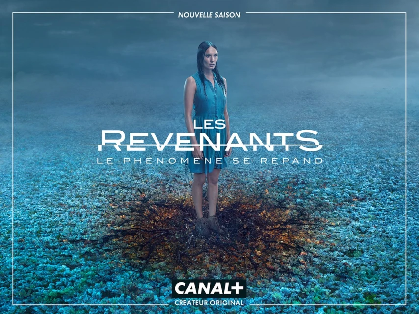 A young woman stands ankle-deep in dark liquid in a mysterious, otherworldly scene with a blue, cloudy sky. TV show poster.