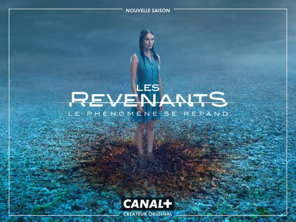 A young woman stands ankle-deep in dark liquid in a mysterious, otherworldly scene with a blue, cloudy sky. TV show poster.