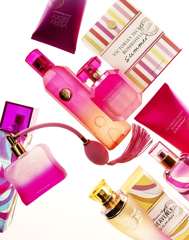 Collection of Victoria's Secret fragrance products arranged in a visually appealing manner against a bright, clean background.
