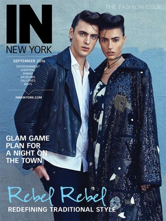 Magazine cover featuring a male and female model posing together against a textured grey wall, styled by hair stylist Keiko Hamaguchi.