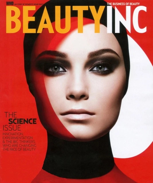 Beauty Inc. magazine cover featuring a close-up of a woman with dramatic eye makeup on a red background with white and black accents.