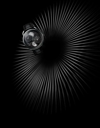 Elegant wristwatch on a black leather strap presented against an abstract radial silver line pattern on a dark backdrop creating a dramatic effect.