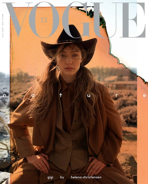 Vogue magazine cover featuring Gigi Hadid in a brown outfit and cowboy hat, posing outdoors against a golden-toned landscape background.